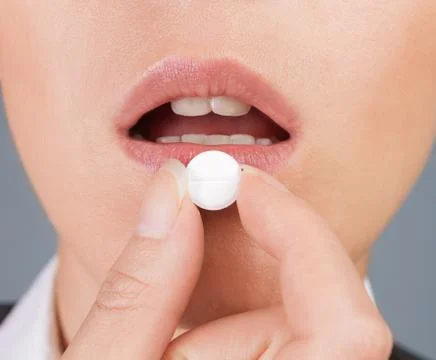 Round white pill Stock Photos