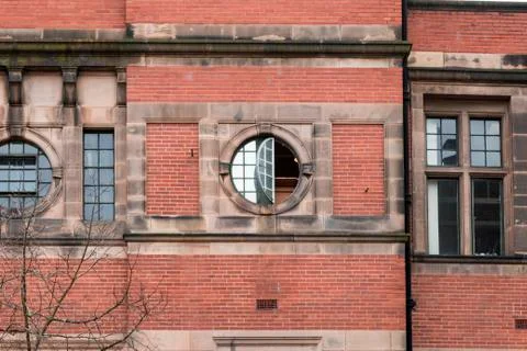 Round window in a Brick wall Stock Photos