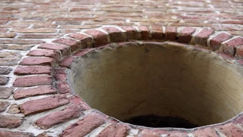 A round window in an old medieval restored brick building. Stock Footage 94401059