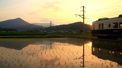 The Round Window Train of Bessho Line, Rural Landscapes, Mount Fudamine, and the Vídeo Stock 330310850
