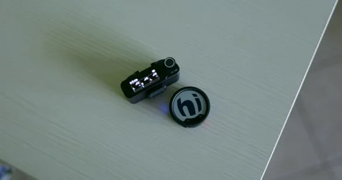 Round Wireless Microphone Transmitter And Receiver On Table 库存影片 348894680