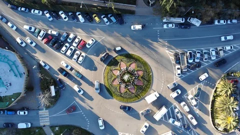 Roundabout aerial top down view footage from above with vehicles circling around Stock Footage 106560339