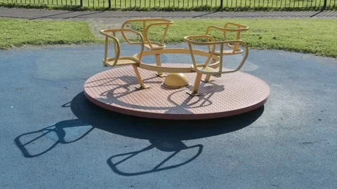 Roundabout in the children's playground Stock Footage 139972025