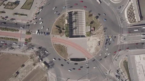 Roundabout city traffic, top view. LOG footage Stock Footage 104809558