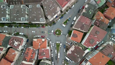 Roundabout intersection among residential buildings in Istanbul Stock Footage 242864432