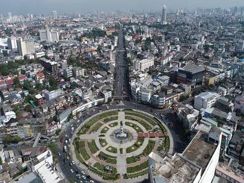 Roundabout intersection city road with building around Stock Footage 84408157
