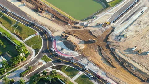 Roundabout intersection construction in North Port, Florida. Development of Stock Footage 299803685