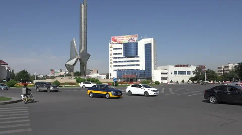 Roundabout intersection with large sculpture Stock Footage 47451704