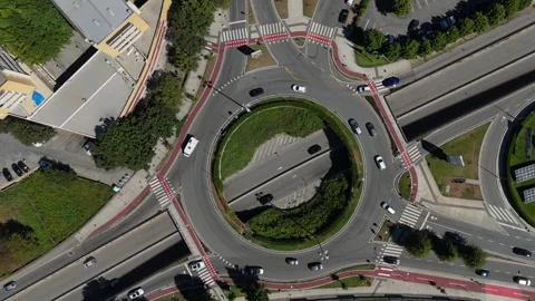 Roundabout with multiple road junctions and heavy traffic in Braga, Stock Footage 286337912