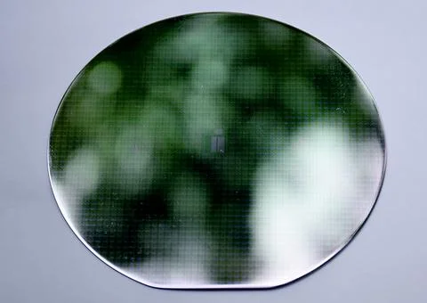Rounded circular silicon monocrystalline with sharp reflection for solar cells Stock Photos