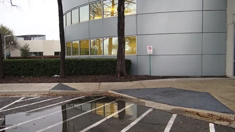 Rounded modern commercial building - side of facade Stock Footage 87342685