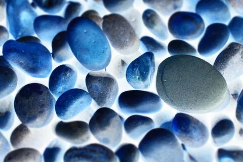 Rounded pebbles on beach Stock Photos