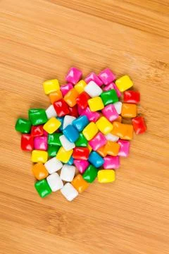 Rounded square unchewed multicolored bubble gum pieces Stock Photos