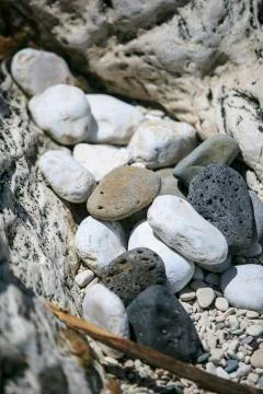 Rounded Stones on the beach Stock Photos