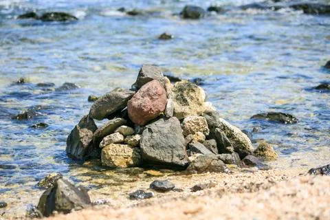 Rounded Stones on the beach Stock Photos
