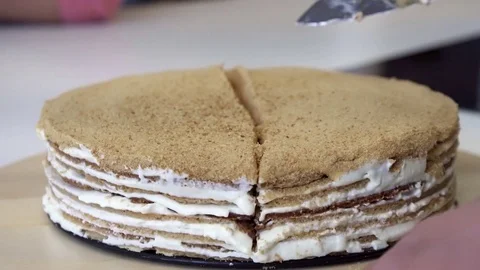 Rounding a round cake Stock Footage 83733501