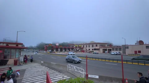 Route 101 &amp; Highway 1 with toll gate during foggy day, San Francisco, CA - 4K Stock Footage 318856426