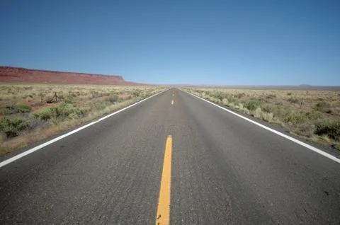 Route 89A, AZ strecthing toward the horizon with the Vermillion clifs to the lef Stock Photos