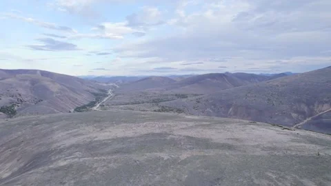 The route between the mountains far from civilization Stock Footage 252828842