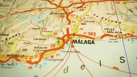 Route to malaga, spain – gliding camera over atlas map Stock Footage 345385241