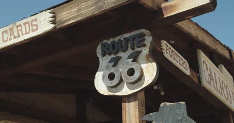 Route sixty six sign on side of bar shop truckstop Stock Footage 132227106