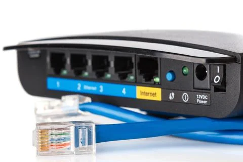 Router and ethernet cable Stock Photos