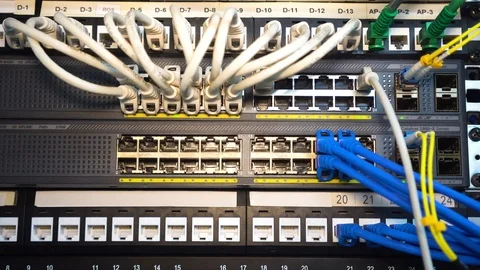 Router and switch lights blinking at a data center Stock Footage 98484711