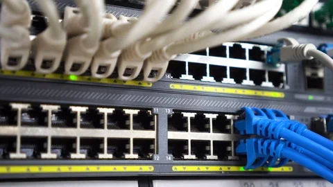 Router and switch lights blinking at a data center Video stock 98484779