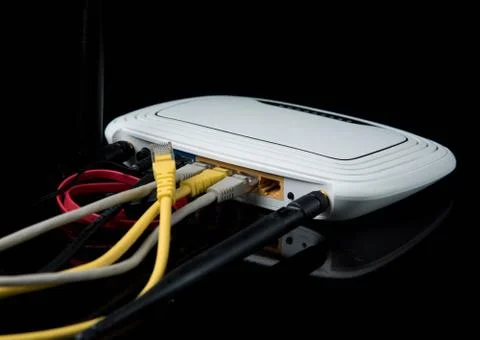Router cable, Internet, isolated on dark background Stock Photos