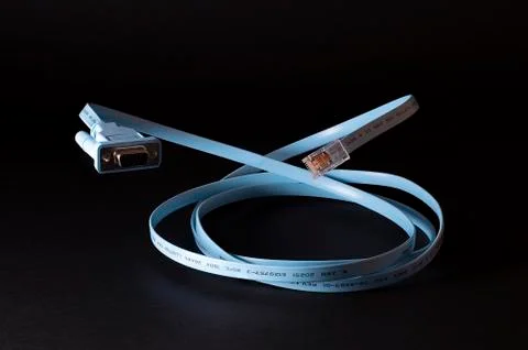 Router console cable on black background Stock Photos