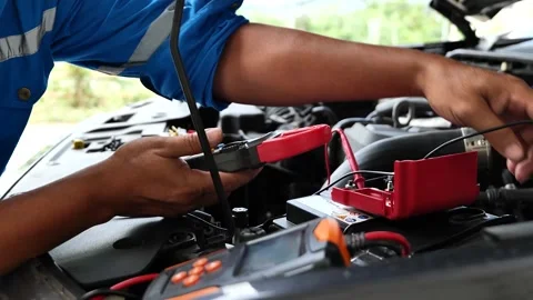 Routine engine inspection by a certified auto mechanic highlights quality servic Stock Footage 328639863