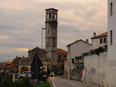 Routine traffic in a small town in Italy during a cloudy day. Time lapse Stock Footage