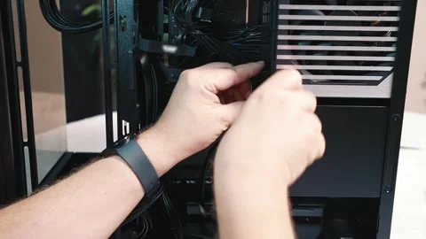 Routing power cable inside personal computer case Stock Footage 340881357