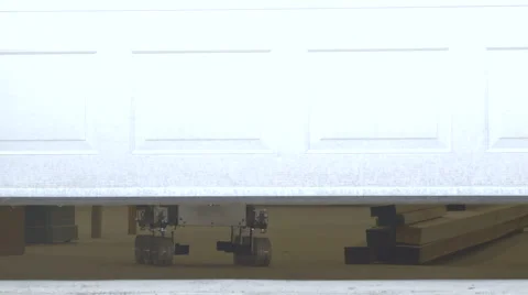 Rover Robot Getting out a Garage Door Stock Footage 64353711