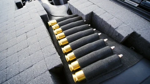 Row of Ammunition on a Rifle Stock Stock Footage 124984851