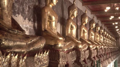 Row of ancient buddha statues in buddhist temple Stock Footage 342610587