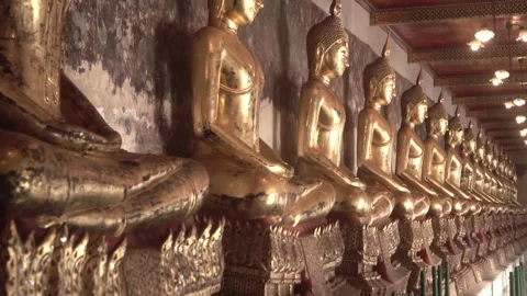 Row of ancient buddha statues in buddhist temple Stock Footage 342610910