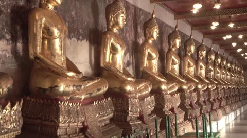 Row of ancient buddha statues in buddhist temple Stock Footage 342615267