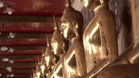 Row of ancient buddha statues in buddhist temple Video stock 347712764