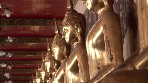 Row of ancient buddha statues in buddhist temple Stock Footage 347713322