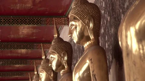 Row of ancient buddha statues in buddhist temple Video stock 347713591