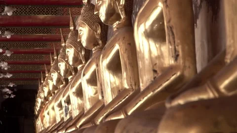 Row of ancient buddha statues in buddhist temple Stock-Footage 347713592