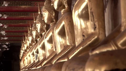 Row of ancient buddha statues in buddhist temple Stock Footage 347713645