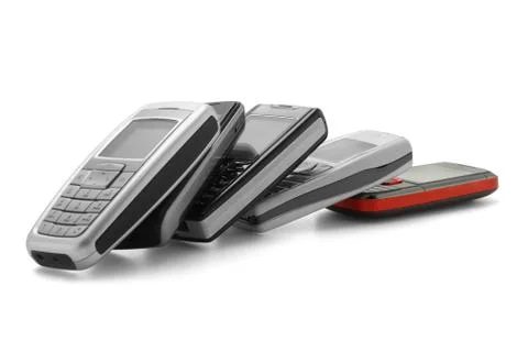 Row of assorted cellphones Stock Photos
