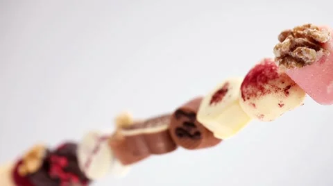 Row of assorted chocolates Video stock 8573118