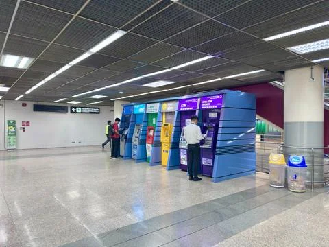 Row of automatic teller machines ATM from various banks inside the hall Stock Photos