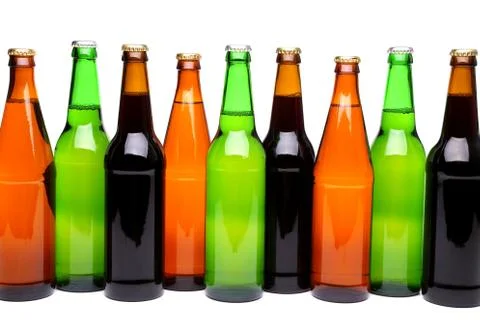 Row of beer bottles. Stock Photos