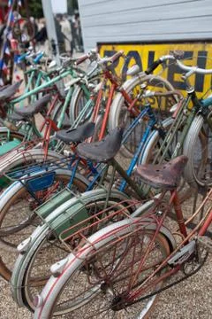 Row of bicycles in a cycle rack Stock Photos