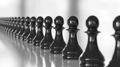 Row of Black Chess Pawns on Reflective Surface 3d render looping animation Stock Footage 299463908