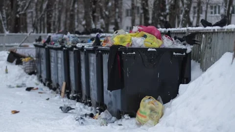 Row of black plastic garbage bins overfilled with household waste, various Stock Footage 336246659